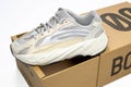 Adidas Yeezy boost 700 V2 Cream. limited collection sneakers with box. white background.