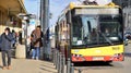 Warsaw, Poland. 8 March 2023. Crowd of people walking down an urban sidewalk Royalty Free Stock Photo