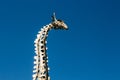 Warsaw, Poland - March 18, 2020: Head of Metal Giraffe Sculpture in Praga Park in Warsaw