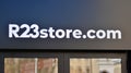 Sign R23 store.com. Company signboard R23 store.com Royalty Free Stock Photo