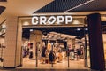 WARSAW. POLAND - MAY 21, 2023: Cropp brand retail shop logo signboard on the storefront in the shopping mall