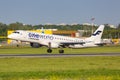 Finnair Embraer 190 airplane Warsaw airport OneWorld special colors Royalty Free Stock Photo