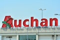 Sign Auchan. Company signboard Auchan.