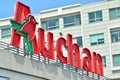 Sign Auchan. Company signboard Auchan.