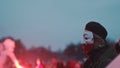 Warsaw, Poland 11.11.2020 - 102nd annywersary of Poland`s independence day. Man with facemask in polish glag colors