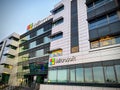 Warsaw, Poland - Oct 02, 2025: Modern office building featuring the Microsoft logo. Building with large windows with Royalty Free Stock Photo