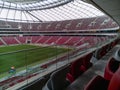 Beautiful and big tribune with white and red chairs of polish national stadium PGE Narodowy