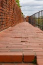 Beautiful red brick old town fortifications with defensive walls and towers and warsaw Barbican Royalty Free Stock Photo