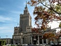 Fountain and many parked cars near the Palace of Culture and Science in Warsaw on a sunny autumn day Royalty Free Stock Photo