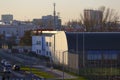 The setting sun illuminates the school buildings