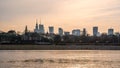 Warsaw, Poland - panorama of a city skyline at sunset. Cityscape view of Warsaw. Skyscrapers in Warsaw. Sunset over the river Royalty Free Stock Photo