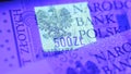 Warsaw, Poland 01.01.2021 Polish Zloty banknote under the UV counterfeit testing