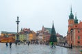 Warsaw, Poland - 02.01.2019: Royal Castle, ancient townhouses and Sigismund`s Column in Old town in Warsaw, Poland. New Year Royalty Free Stock Photo