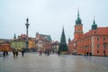 Warsaw, Poland - 02.01.2019: Royal Castle, ancient townhouses and Sigismund`s Column in Old town in Warsaw, Poland. New Year Royalty Free Stock Photo