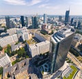 7.22.2022 Warsaw, Poland. Square aerial shot of Rondo 1 Skyscraper and its surroundings. Eclectic city concept.