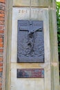 WARSAW, POLAND. A stele with a crucifixion. A memorial to the dead during the Warsaw revolt on January 28, 1944