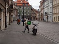 Warsaw/Poland - 21/03/2020 - Food delivery bu Uber Eats in the Old Town.