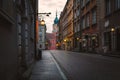 Warsaw, Poland - view of a Old town street with a Royal Castle. Famous tourist attraction and travel destination Royalty Free Stock Photo
