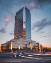 Warsaw, Poland - a view of a skyscraper in the business part of the city. Office buildings in the Warsaw. Long exposure tram Royalty Free Stock Photo