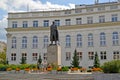 WARSAW, POLAND. A view of Vintsenta Vitosu`s monument against the background of the building