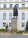 WARSAW, POLAND. Vintsenta Vitosu`s monument against the background of the building