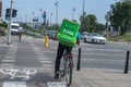 WARSAW, POLNAD - June 15, 2019: UberEATS cycle delivery courier