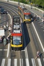 Warsaw public transport in the city centre at Old City stop. Trams, passangers are waityng, geting Royalty Free Stock Photo