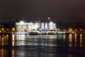 Warship Aurora on the Neva river at night with illumination