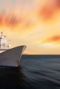 Warship at sea with speed blurred background. Abstract motion, blurred sea with sunset sky