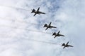 Warships parade on the Neva river. Day of the Russian Navy. Combat aircraft in sky Royalty Free Stock Photo