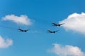 Warships parade on the Neva river. Day of the Russian Navy. Combat aircraft in sky Royalty Free Stock Photo