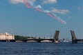 Warships parade on the Neva river. Day of the Russian Navy. Combat aircraft in sky Royalty Free Stock Photo