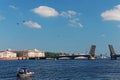 Warships parade on the Neva river. Day of the Russian Navy. Combat aircraft in sky Royalty Free Stock Photo