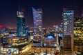 Warszawa, Poland - February 25, 2021: Beautiful architecture of Warszawa city center with modern skyscrapers at night, Poland