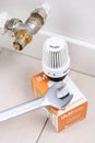 Warszawa, Poland-12.04.2020:Heimeier thermostatic valve and radiator.Heimeier is one of the worlds leading thermostatic valve comp