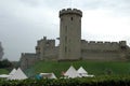 Warwick castle tower and village in warwickshire, england, united kingdom Royalty Free Stock Photo