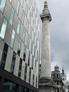The Monument to the Great Fire of London commemorating the Great Fire of London, it stands at the junction of Monument Street and