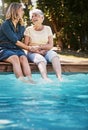 This was a lovely idea, thank you. a happy senior woman spending quality time with her daughter at the pool. Royalty Free Stock Photo