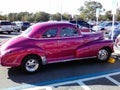 VINTAGE STREET ROD COUPE AT STORE. Royalty Free Stock Photo