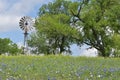 Windmill at the top of a hill in South Texas Royalty Free Stock Photo