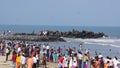 Flocks of people enjoying on a holiday on the seashore side, Puducherry, India