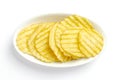 Wasabi and nori flavored salted ruffles, ruffled potato chips in white bowl