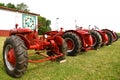 Row of restored Farmall IH tractors