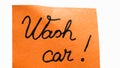 Wash car handwriting text close up isolated on yellow paper with copy space