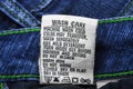 Wash care instructions on jeans Royalty Free Stock Photo