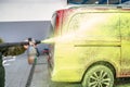 wash cars with green active foam in the garage Royalty Free Stock Photo