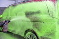 wash cars with green active foam in the garage Royalty Free Stock Photo