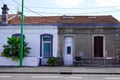 Wash cleaned building house wall facades versus dirty one in city before and after industrial home cleaning