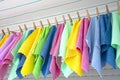 Wash day with laundry on clothesline. Laundry Pins Royalty Free Stock Photo