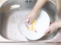 Wash the dishes Royalty Free Stock Photo